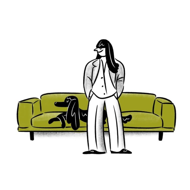 lady with a dog on a sofa